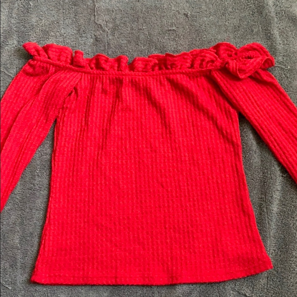 Red of the shoulder crop top.